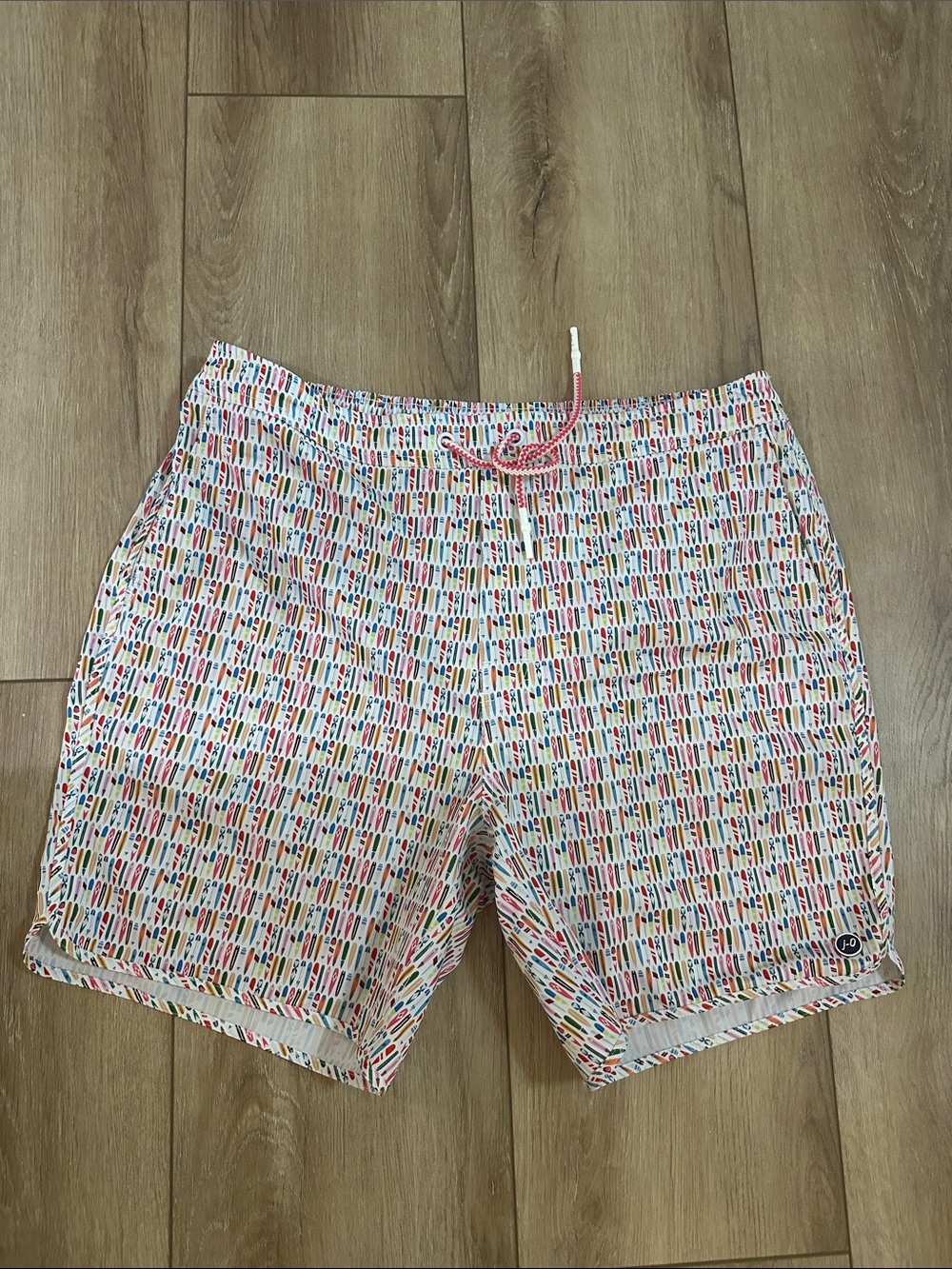 johnnie-O White Swim Shorts with Multicolor Surfboard Print